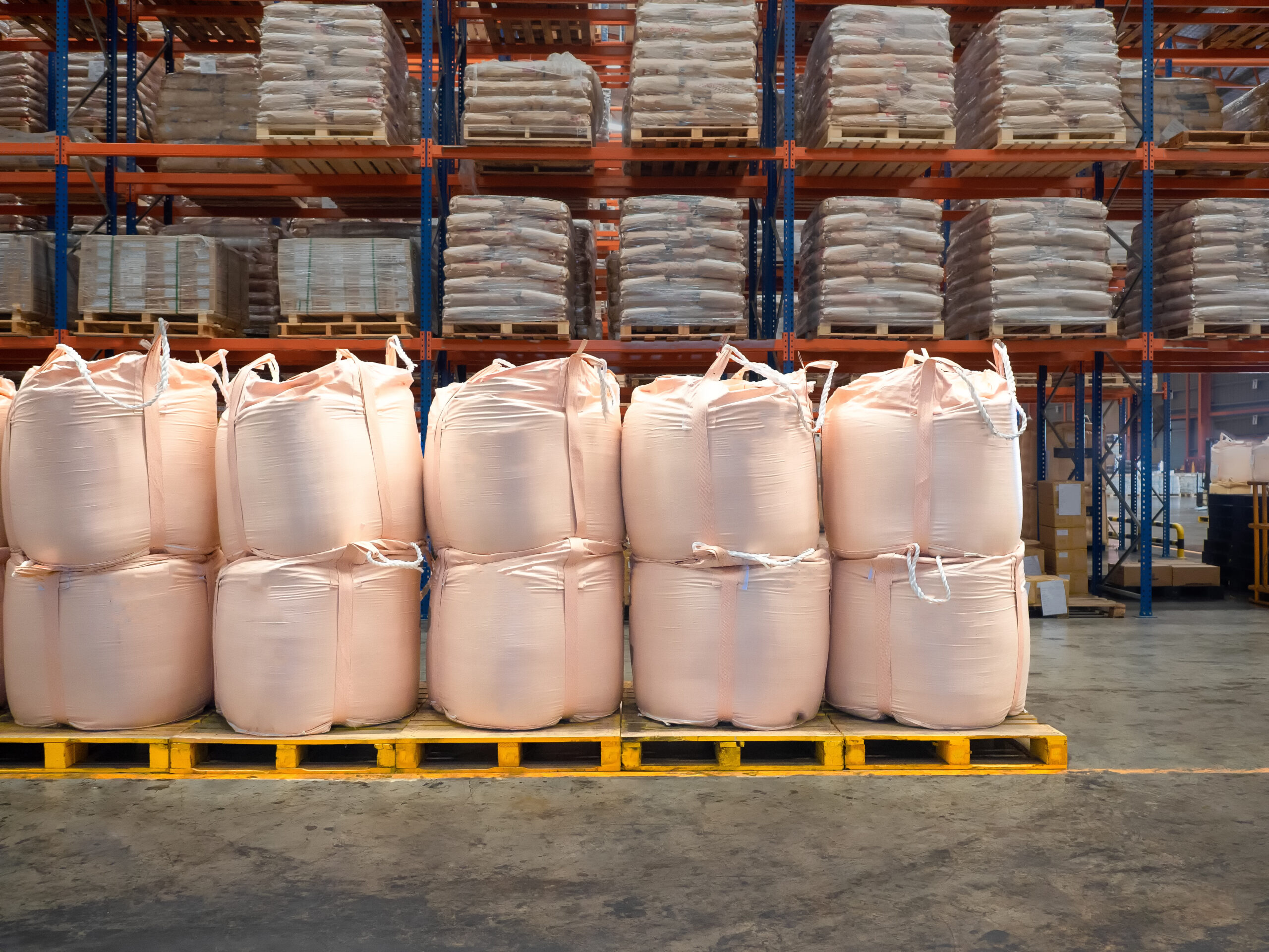 stacking of bulk cargo in jumbo bags are store in warehouse.