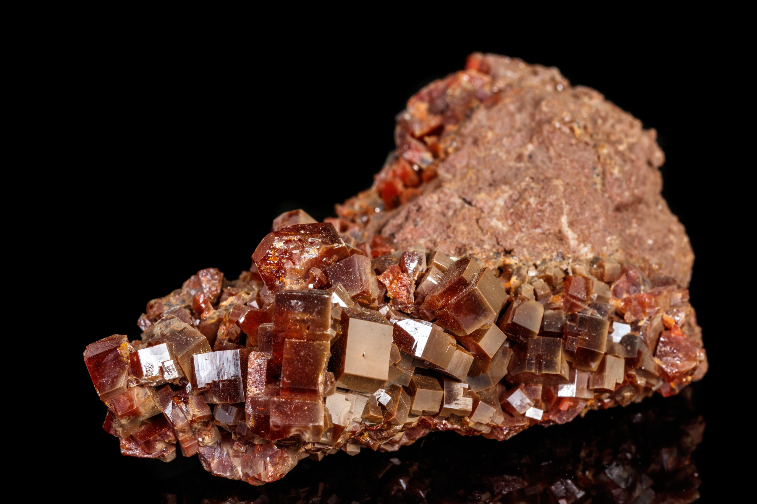 macro mineral stone vanadinite on a black background